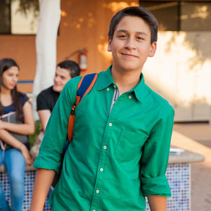 youth at school in a green shirt