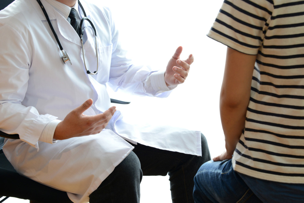 doctor talking to patient