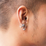 Men's ear piercing