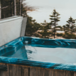 Photo of a hot tub in a scenic forest setting