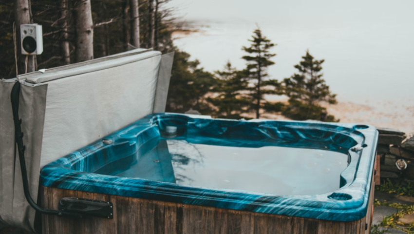 Photo of a hot tub in a scenic forest setting